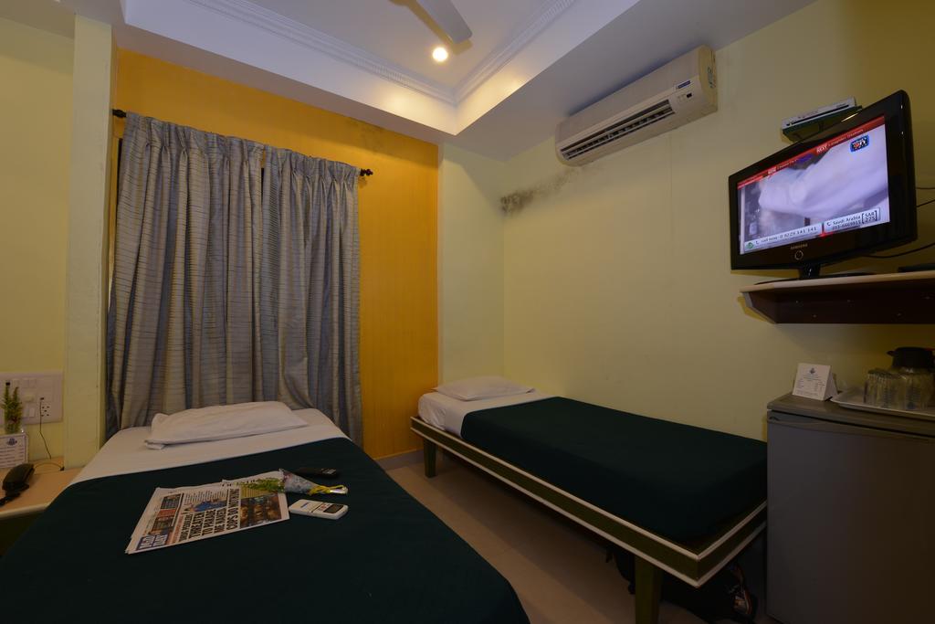 Hotel City Palace Mumbai Rom bilde