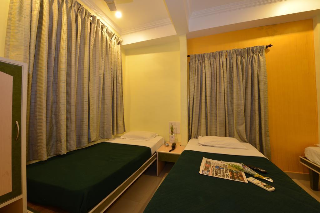 Hotel City Palace Mumbai Rom bilde